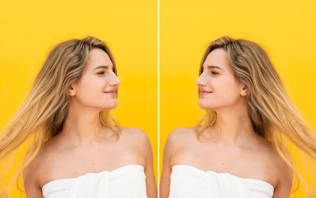 Blonde woman smiling against yellow background